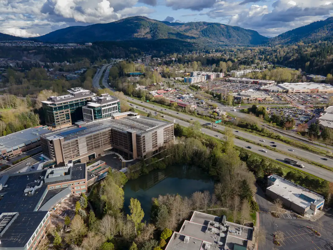 Aerial view of Issaquah, Washington with forested hills beyond